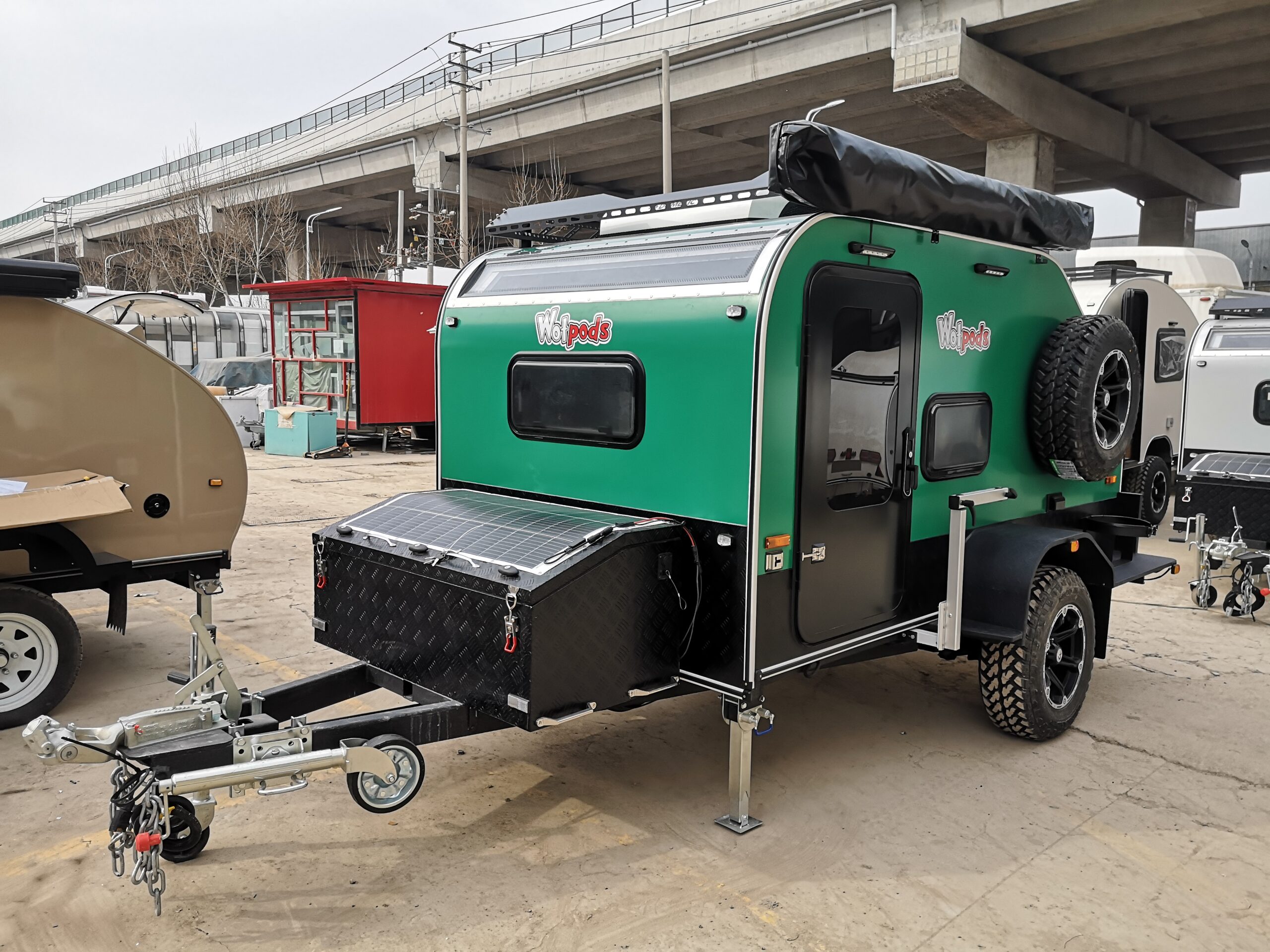 Wotpods Bosspod off-road caravan with solar panel, parked roadside